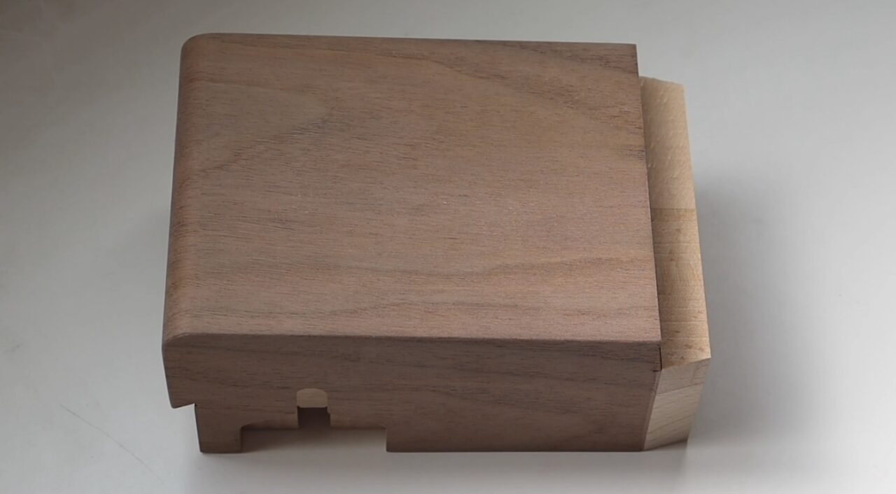Finished piano component made from veneer (face veneer), showcasing wood grain used for aesthetic finishing.
